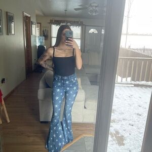 Star Pattern Flare Jeans with Black Tank Top